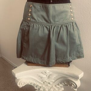 DC green 100% Cotton mini skirt w gold metal logo DC & 8 logo snaps make offer